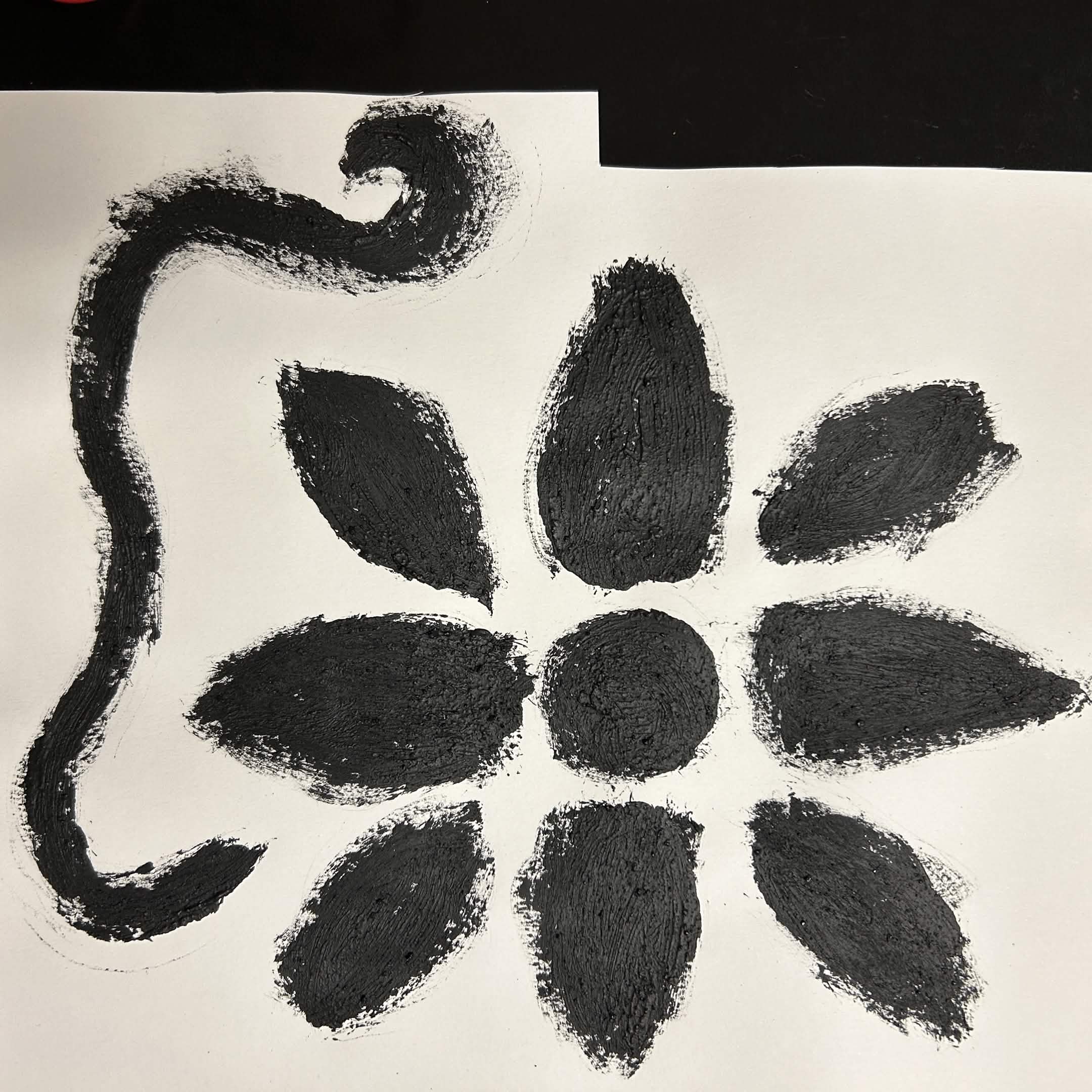 Image on one of my graphite paintings. It it suppose to be a flower.