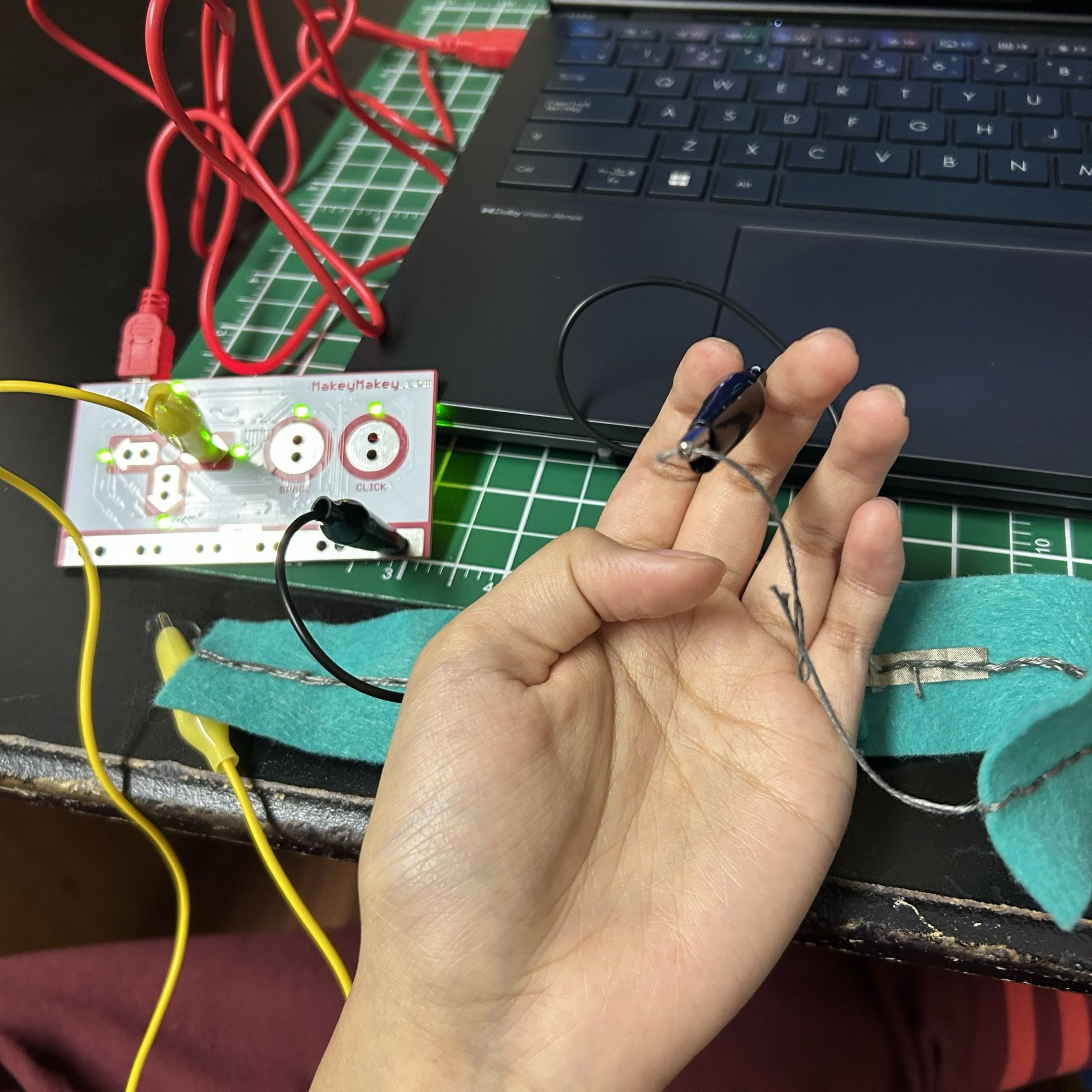 Used the battery holder and conductive tread to complete circuit.