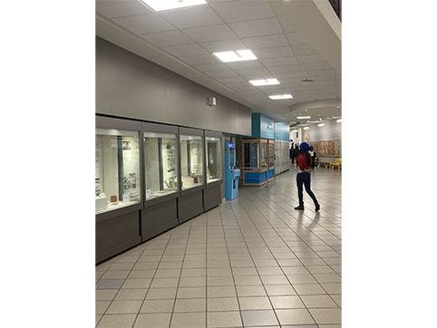 Hallway in front of the Tim Hortons going to the Food Court. An area where show students work is showcased. I haven't seen anyone stop and look they are always walking by.