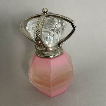 The overall compact size and straight lines make it easy to hold and display on a vanity.